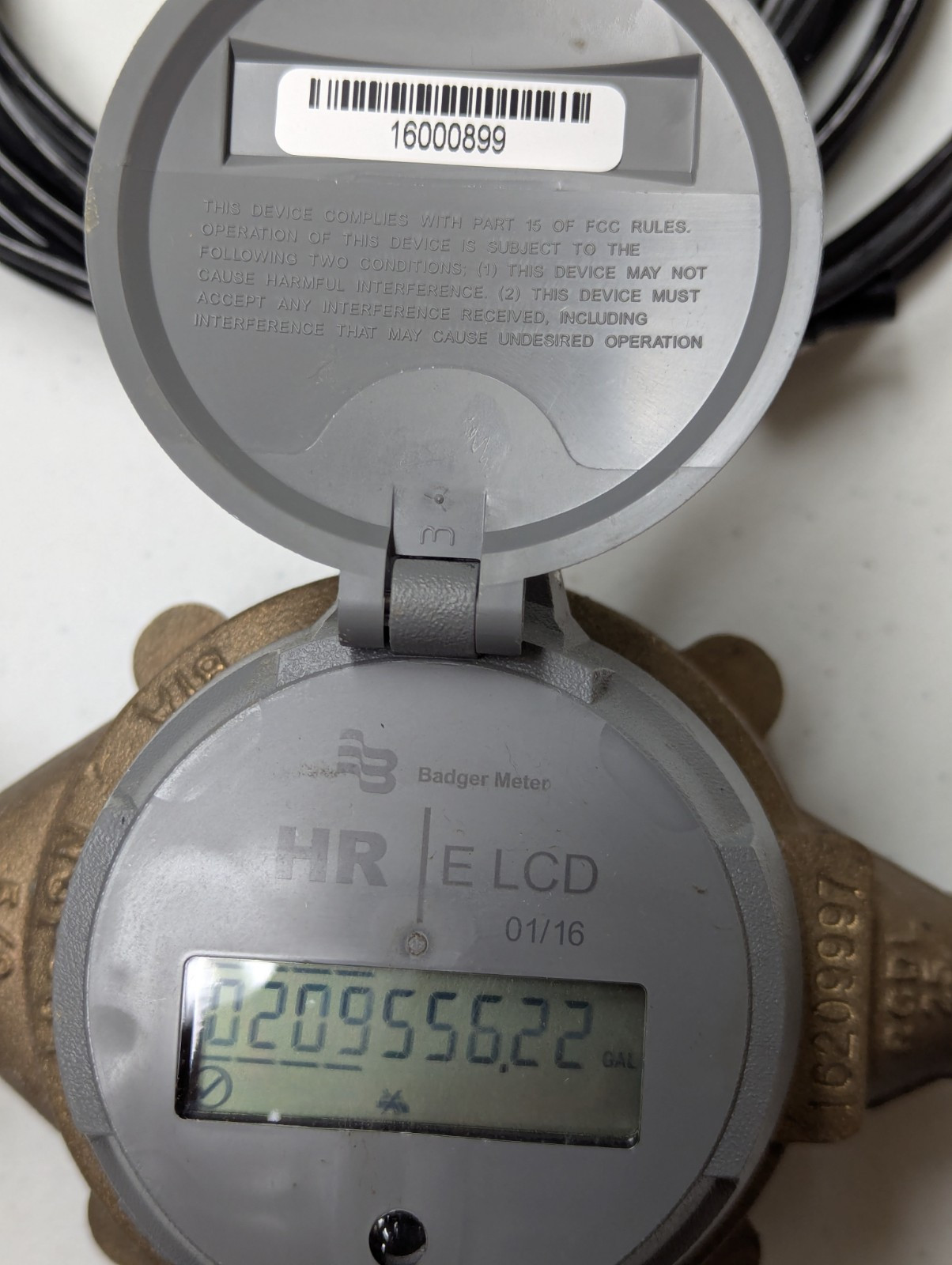 Used Badger model 25 5/8″ brass water meter with HR E lcd register