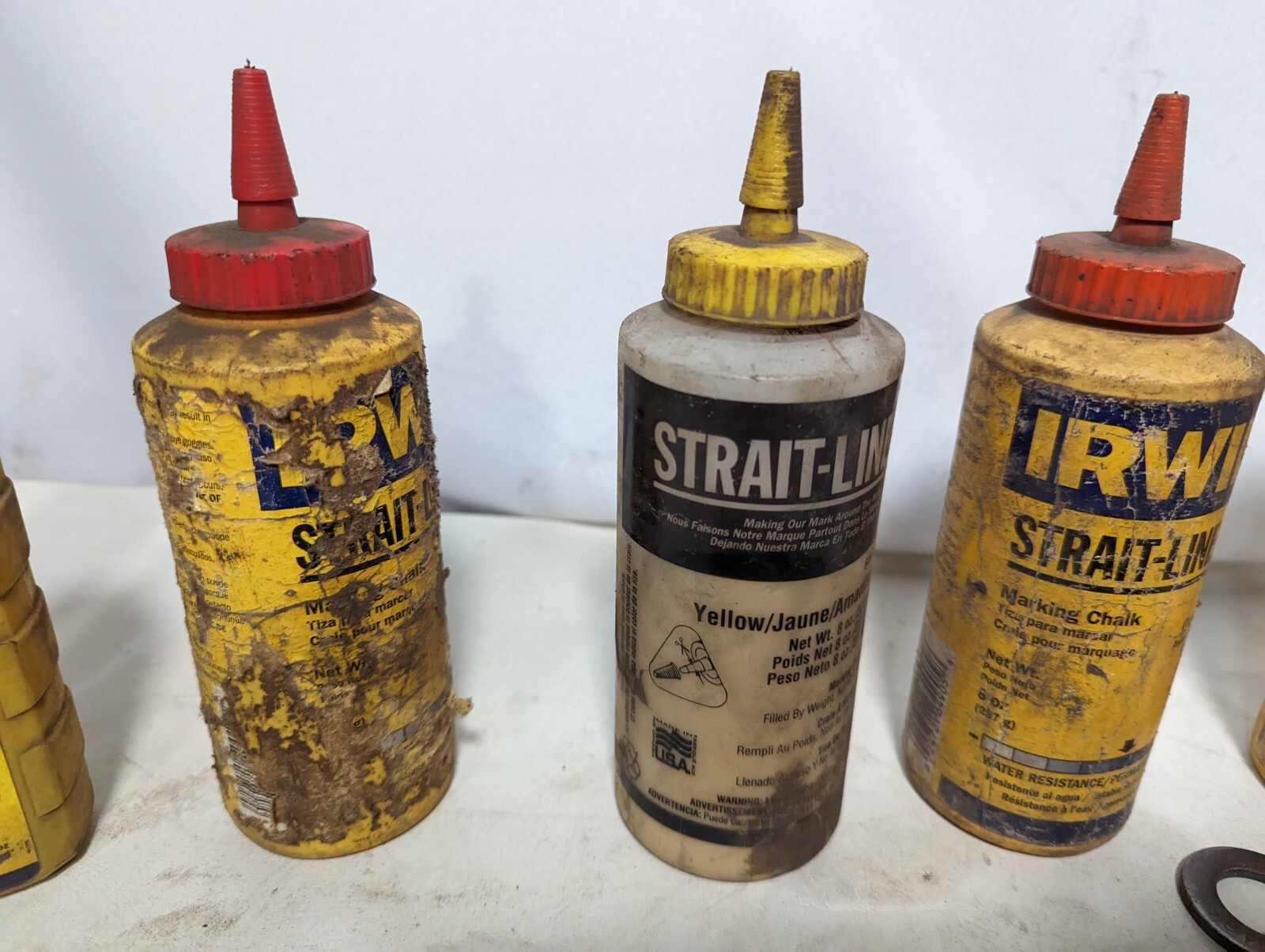 Lot of 9 chalk lines and 3.2 lbs of chalk: Milwaukee 48-22-3910, others