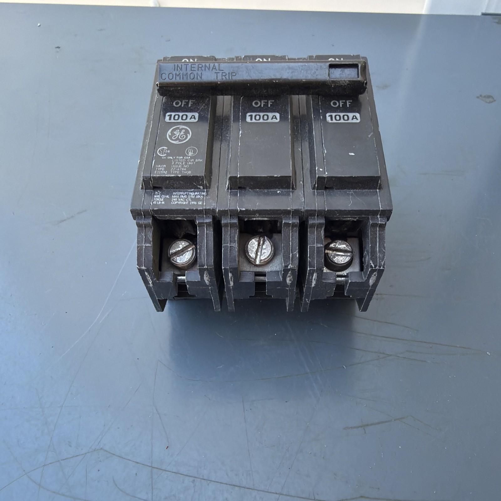 GE 100A 3-Pole 240V AC Circuit Breaker Plug-In/On Plastic Black On/Off