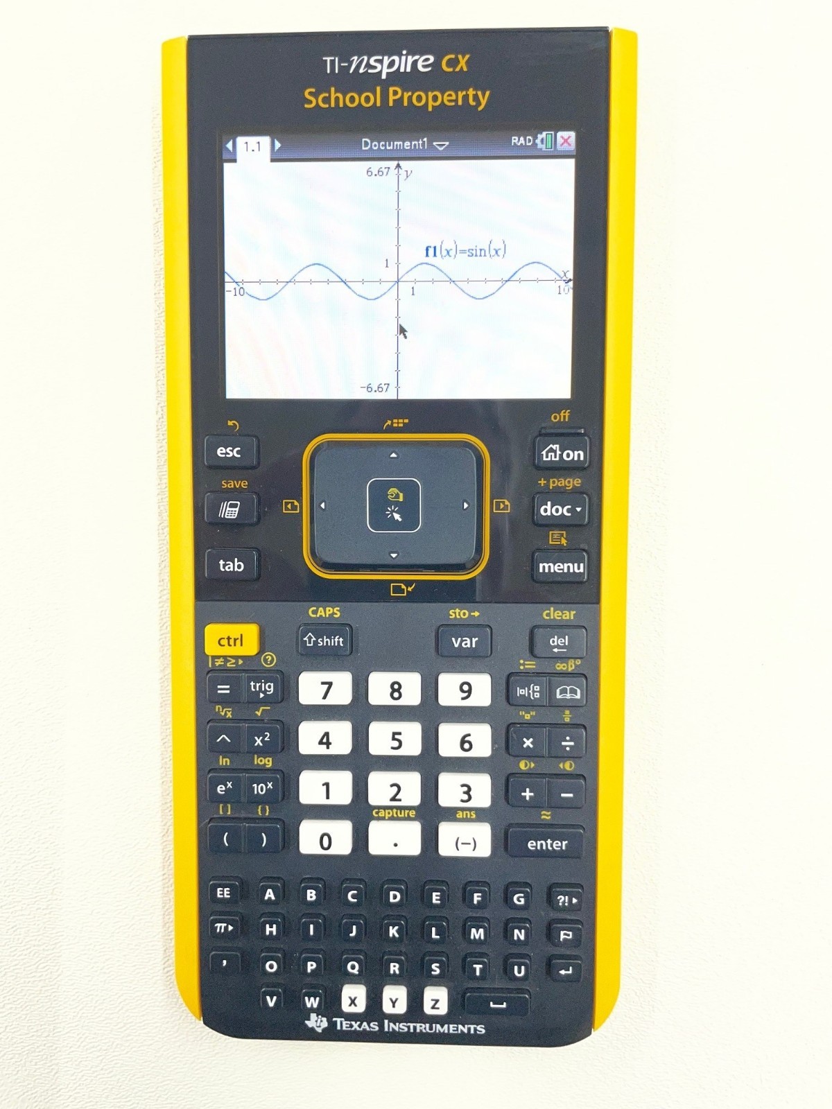 TI Nspire CX Color-Display Graphing Calculator with School Property Markings.