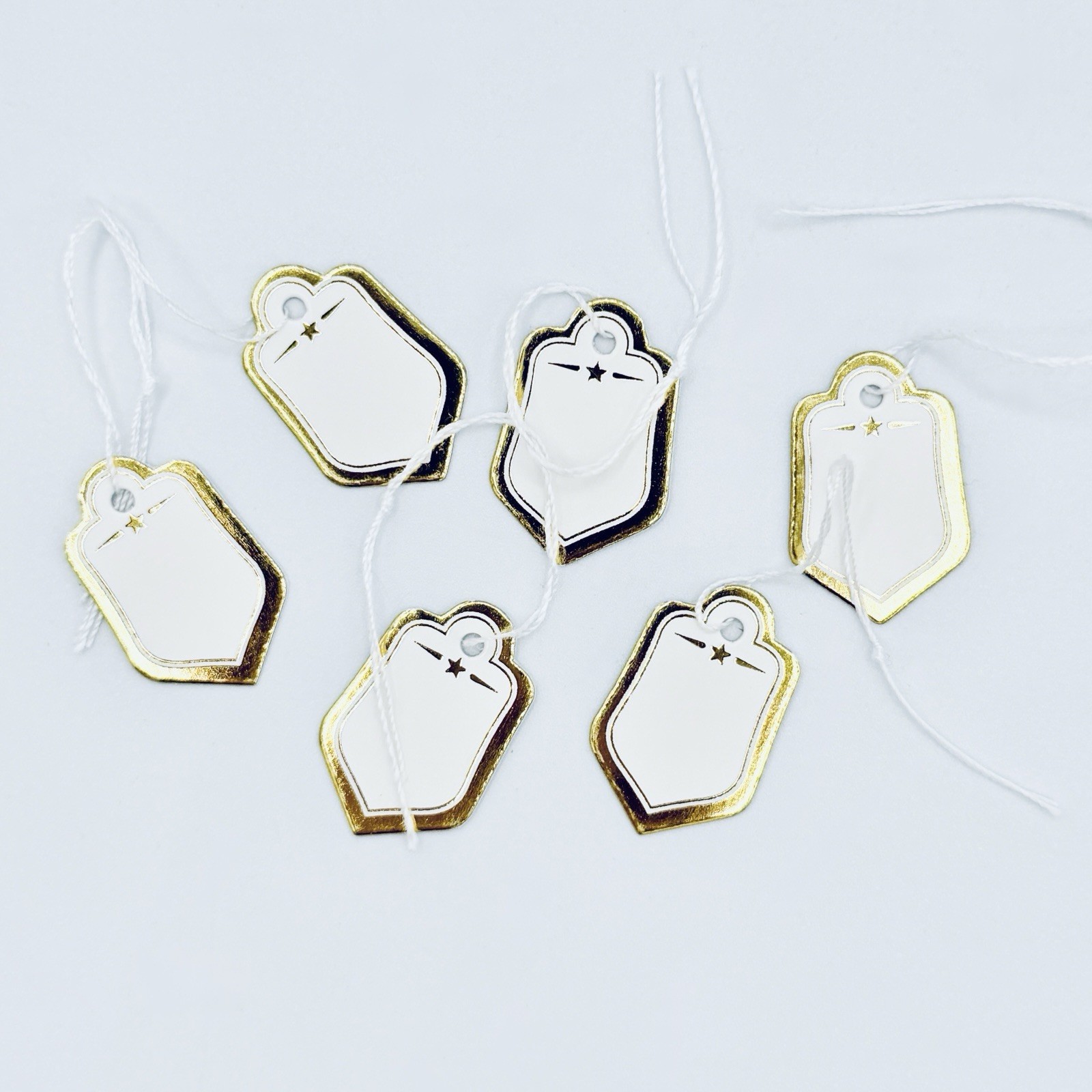 White With Gold Trim Marking Hanging Tags