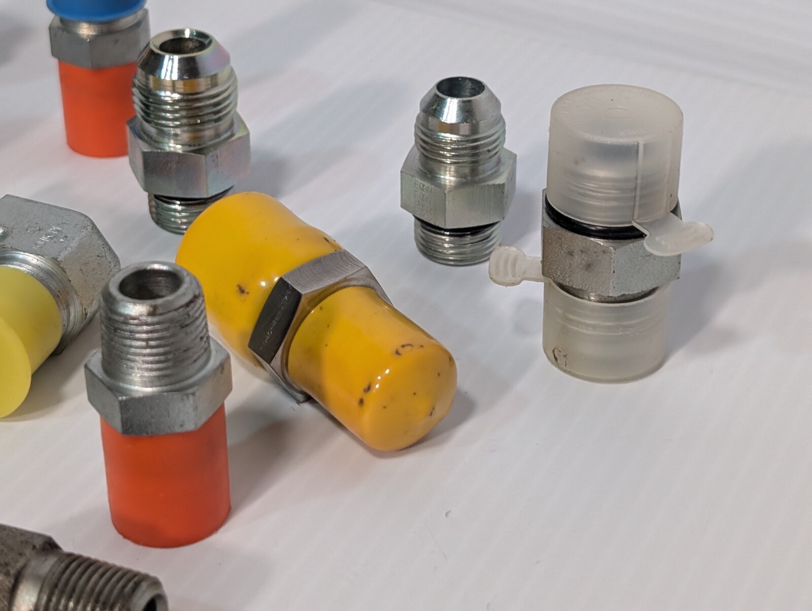 Mixed Lot of Female & Male Swivel Nut Elbow & Industrial Plug Fittings, as shown