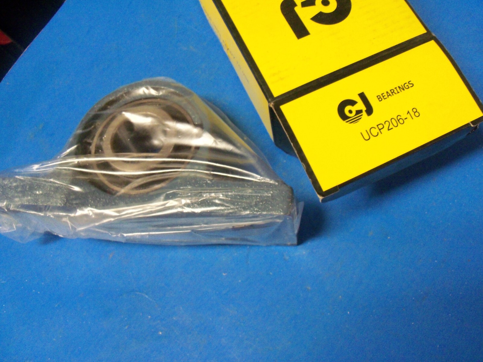 UCP206-18 1-1/8″ Pillow Block Bearing Unit with Solid Base Cast Iron Housing CJ