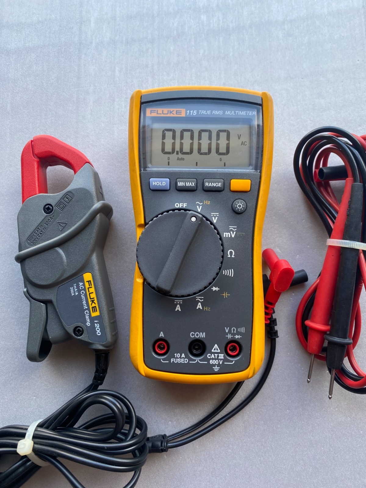 Fluke 115 True RMS Multiple 600V with Fluke i200 AC Current Clamp 1mA/200A