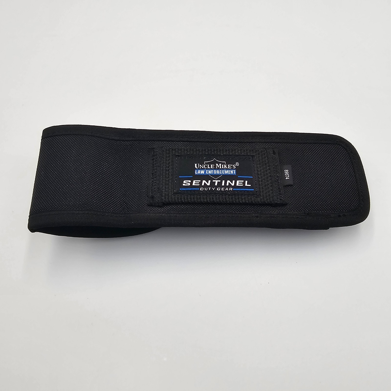 Uncle Mike’s Sentinel Duty Gear Stinger Flashlight Holder 89074 Law Enforcement