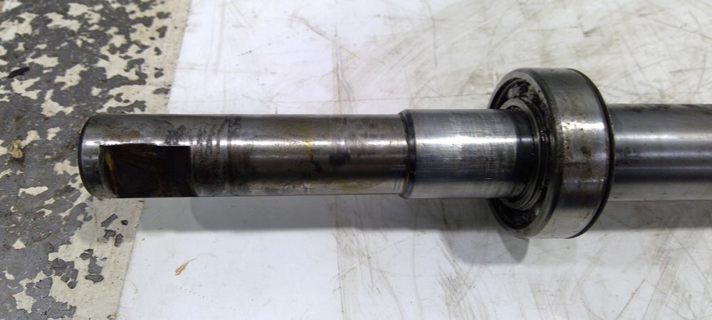 John Deere Upper Rear Feedroll Shaft HXE101171