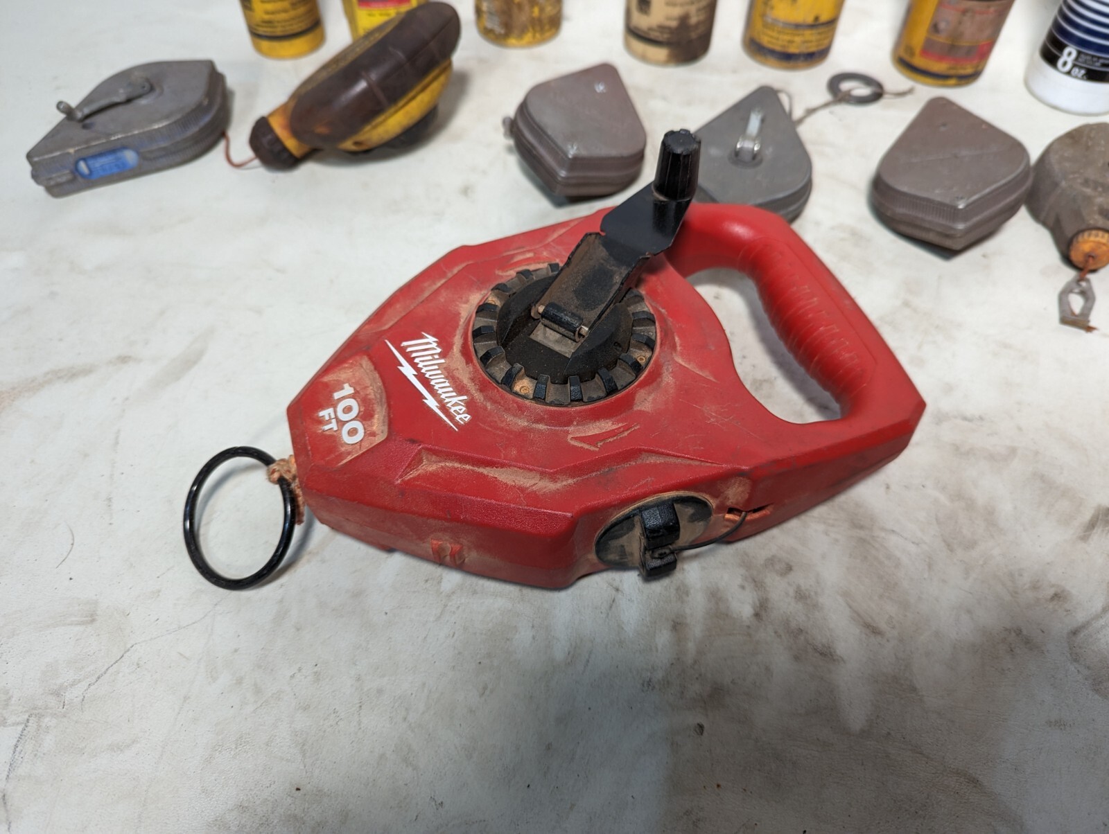 Lot of 9 chalk lines and 3.2 lbs of chalk: Milwaukee 48-22-3910, others
