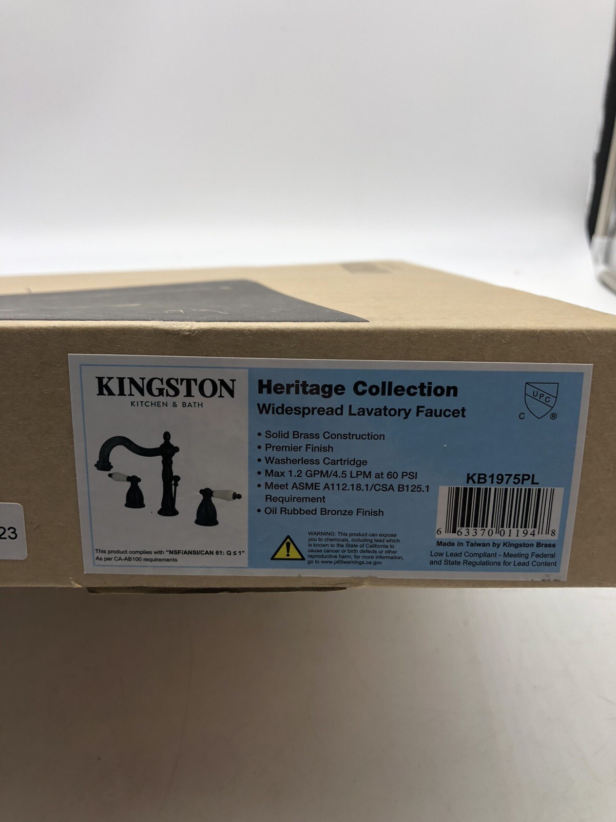 Kingston Brass KB1975PL Heritage Widespread Lavatory Faucet with Porcelain Lever