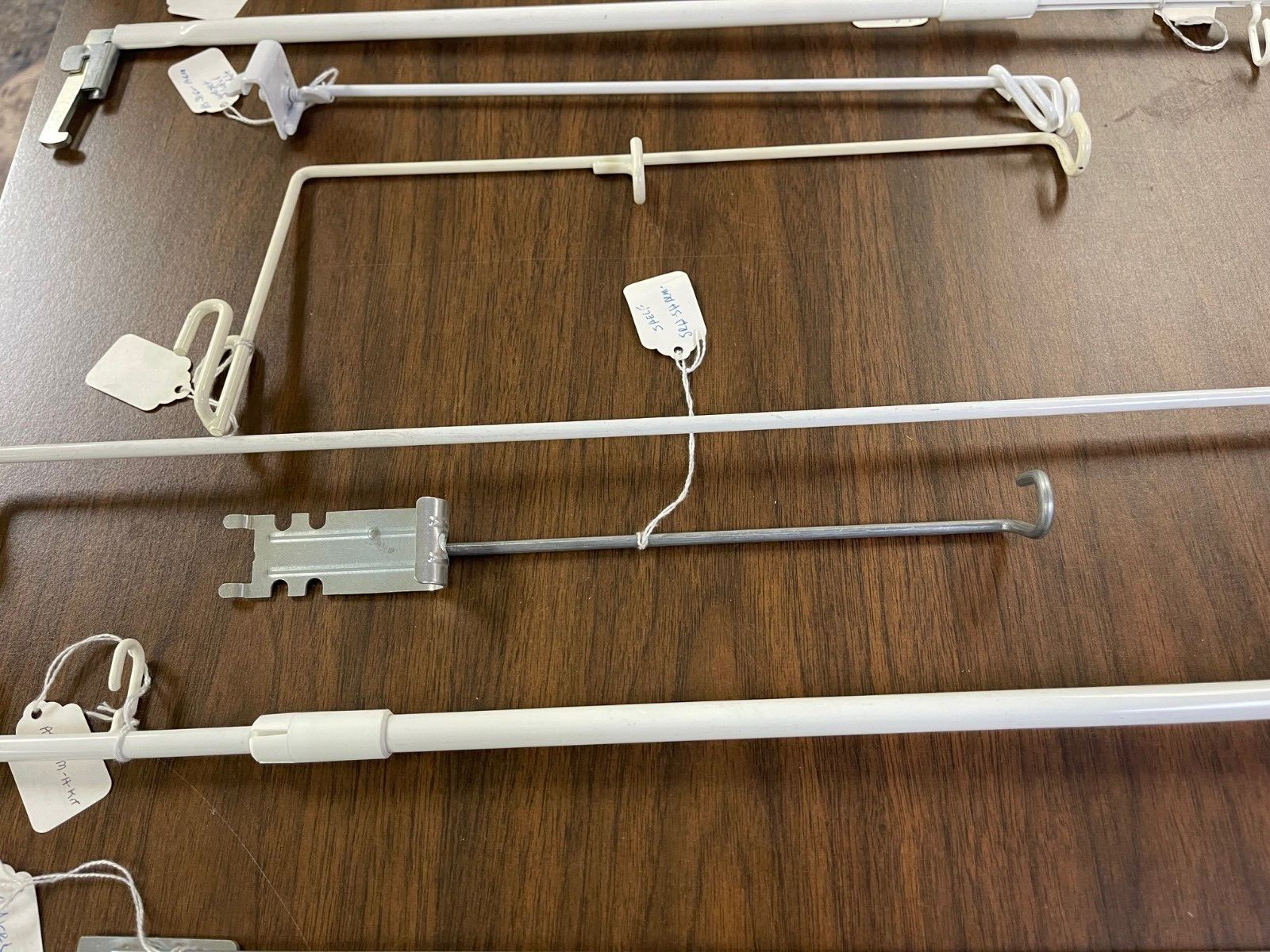 9 pieces Misc. Retail Shelving Metal Hardware- Flag Sign Holders