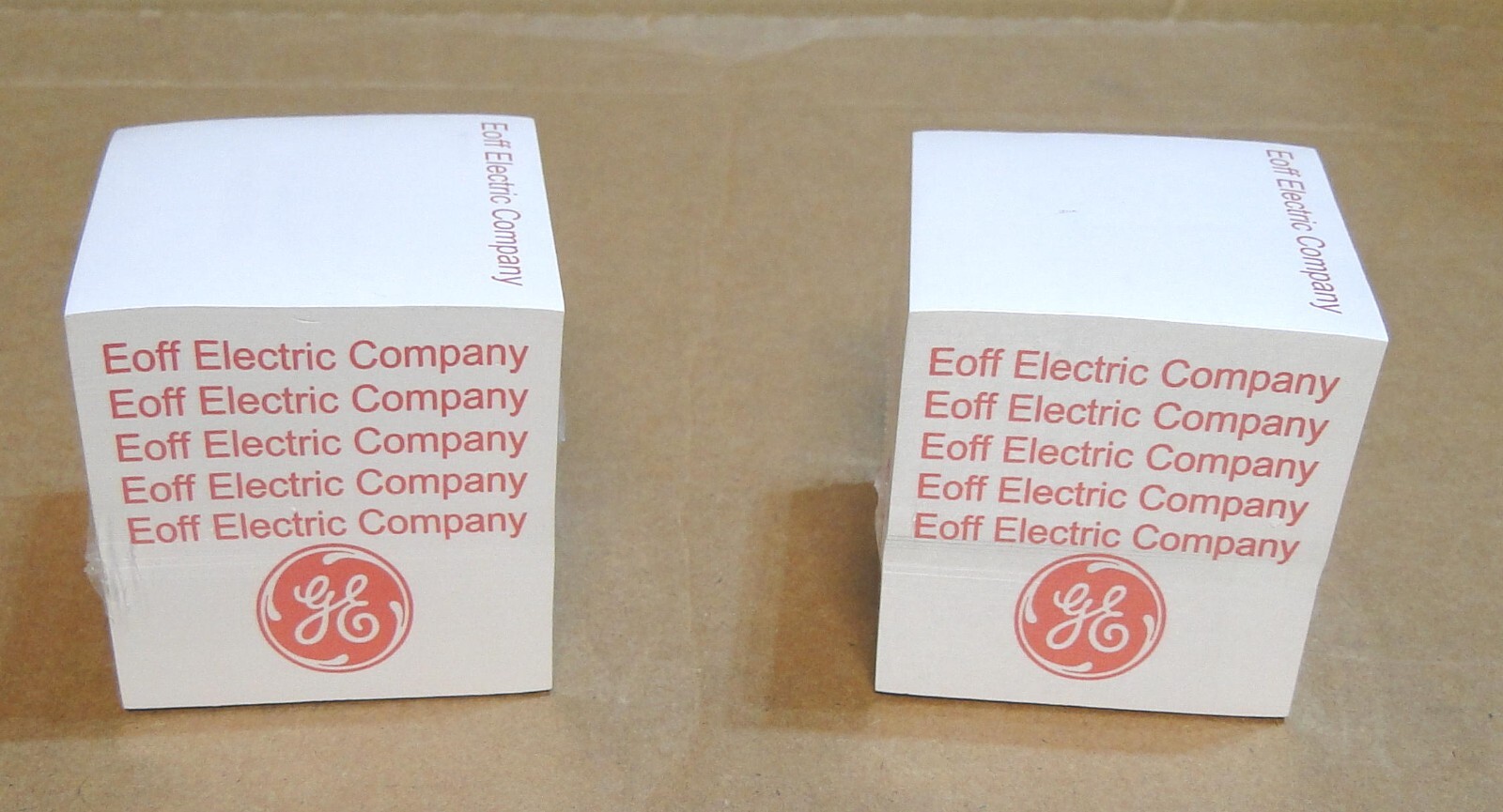 Two 3M 3×3 Post-It Notes Cubes w/Advertising: Alcan, G.E., Eoff Electric Company