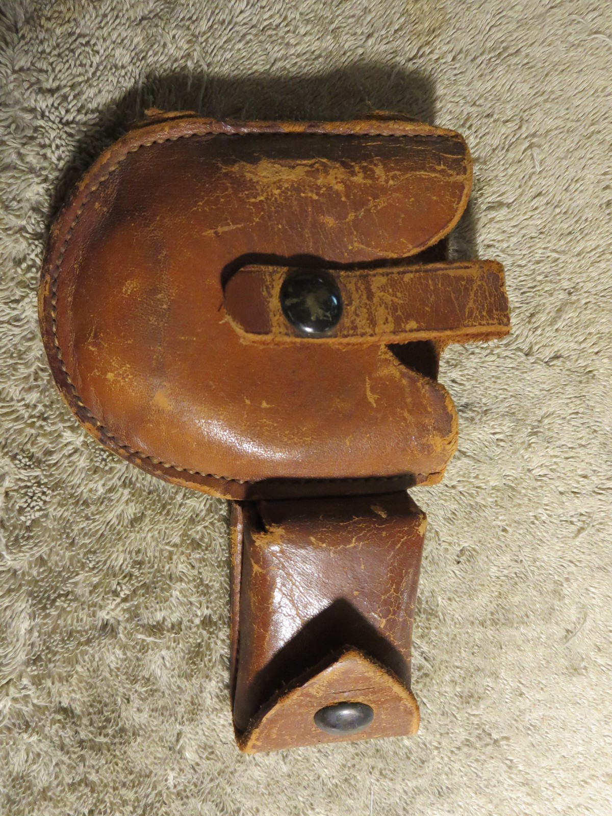 4 handcuff cases: 3 brand names in excellent cond. 1 older, modified, no name.