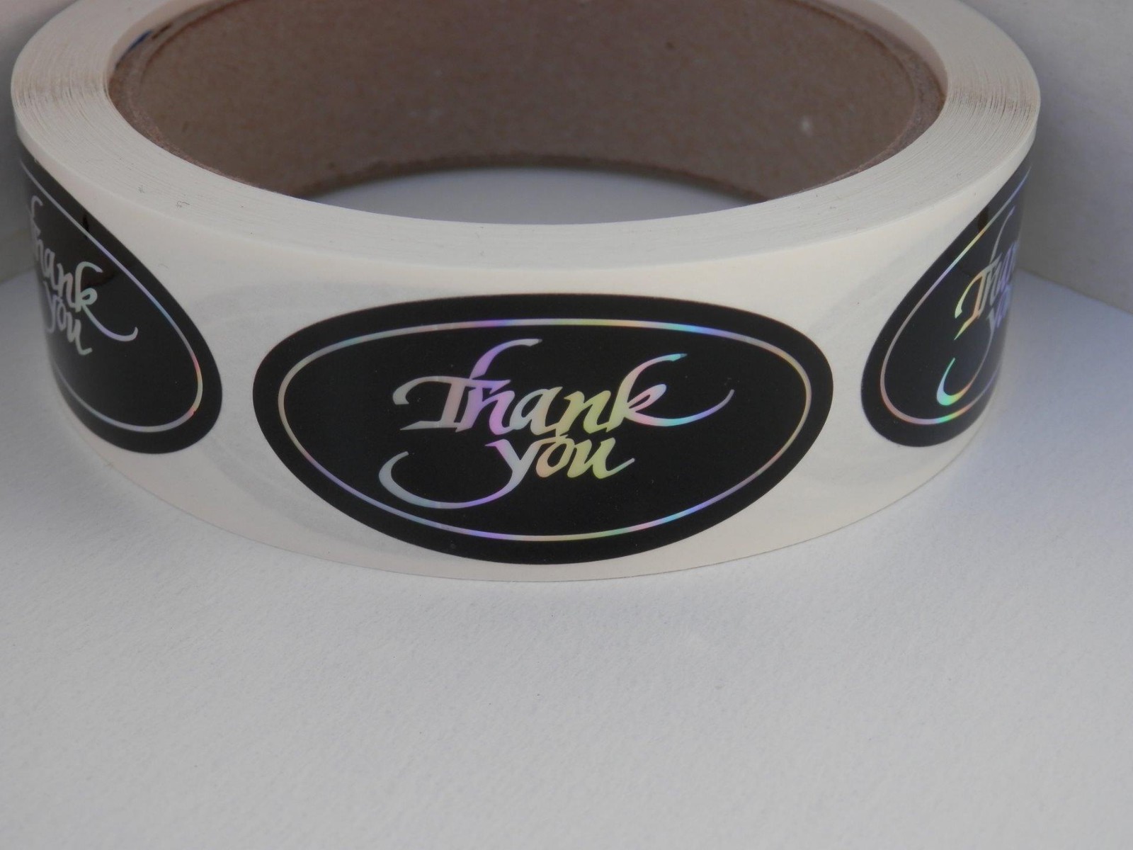 THANK YOU 1×2 oval Sticker Label holographic rainbow letters/black bkgd 250/rl