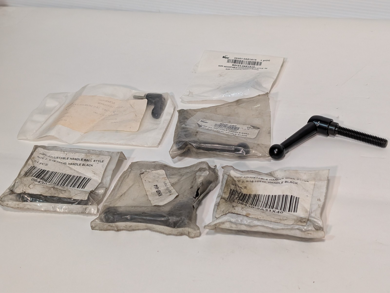 Lot of 7 KIPP K0123.0AE1X15, KHB-280, KHB-64 adjustable ball handles as shown