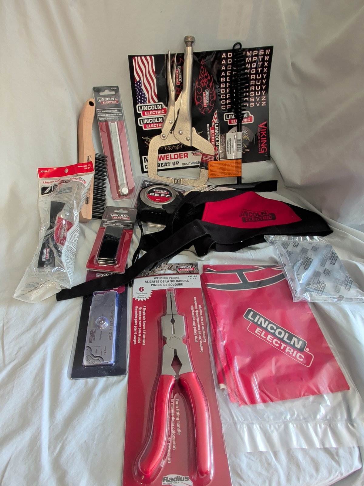 Collection of Lincoln Welder branded merchandise