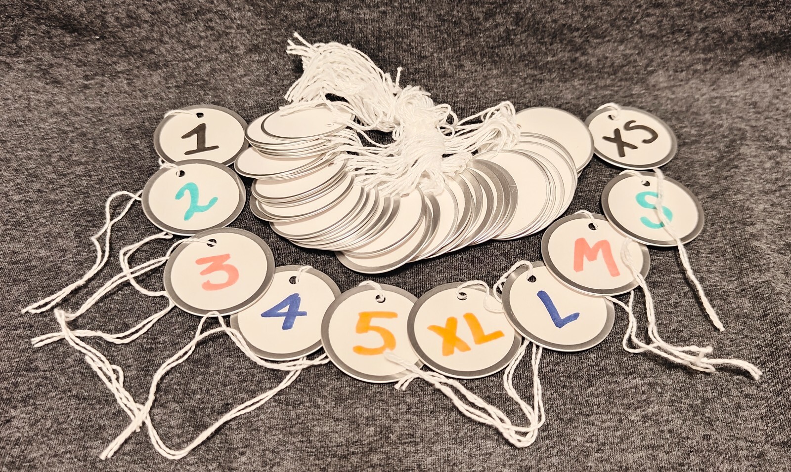 Metal Rim Tags, Key Tags round Blank Paper Tags, Knotted Strings Attached.