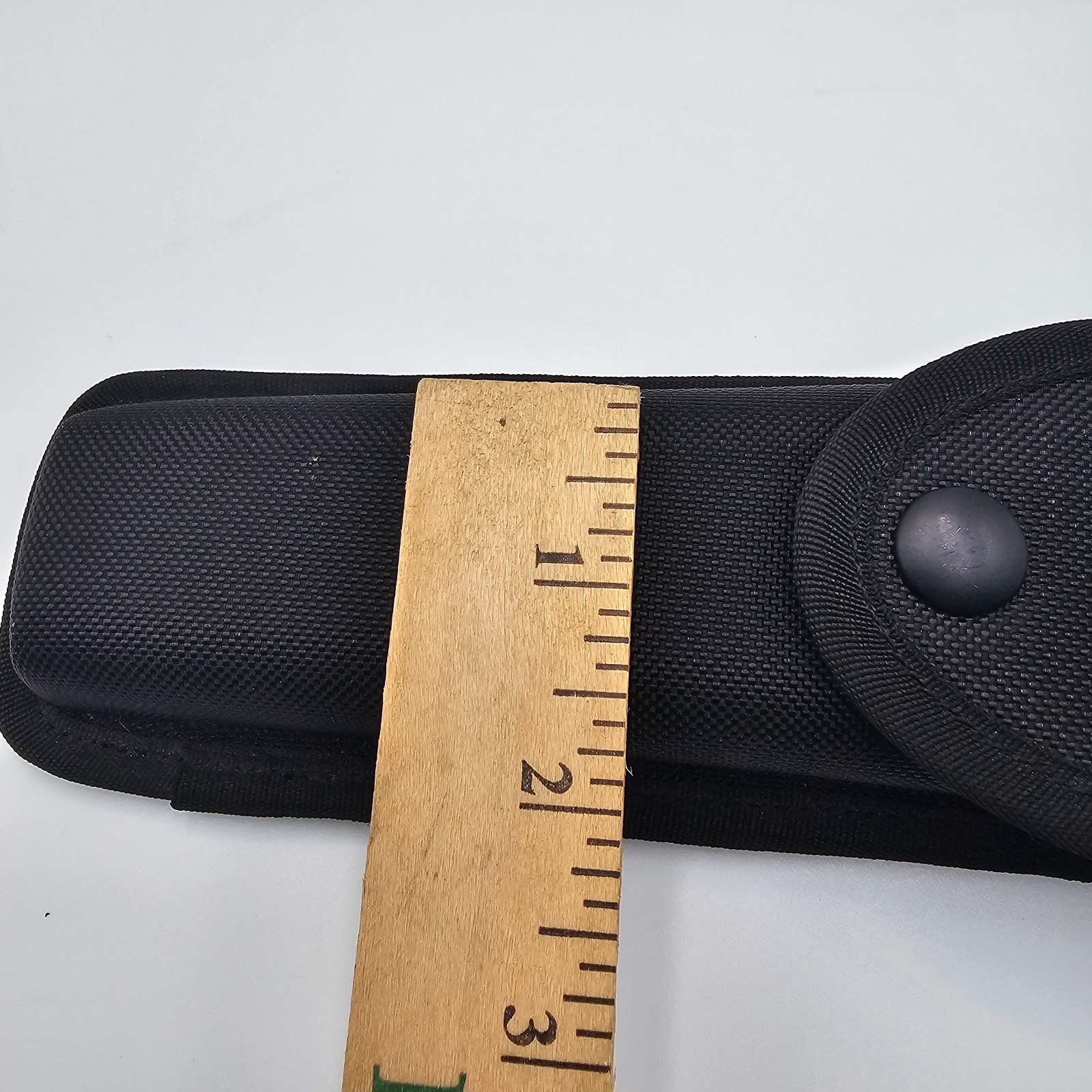 Uncle Mike’s Sentinel Duty Gear Stinger Flashlight Holder 89074 Law Enforcement