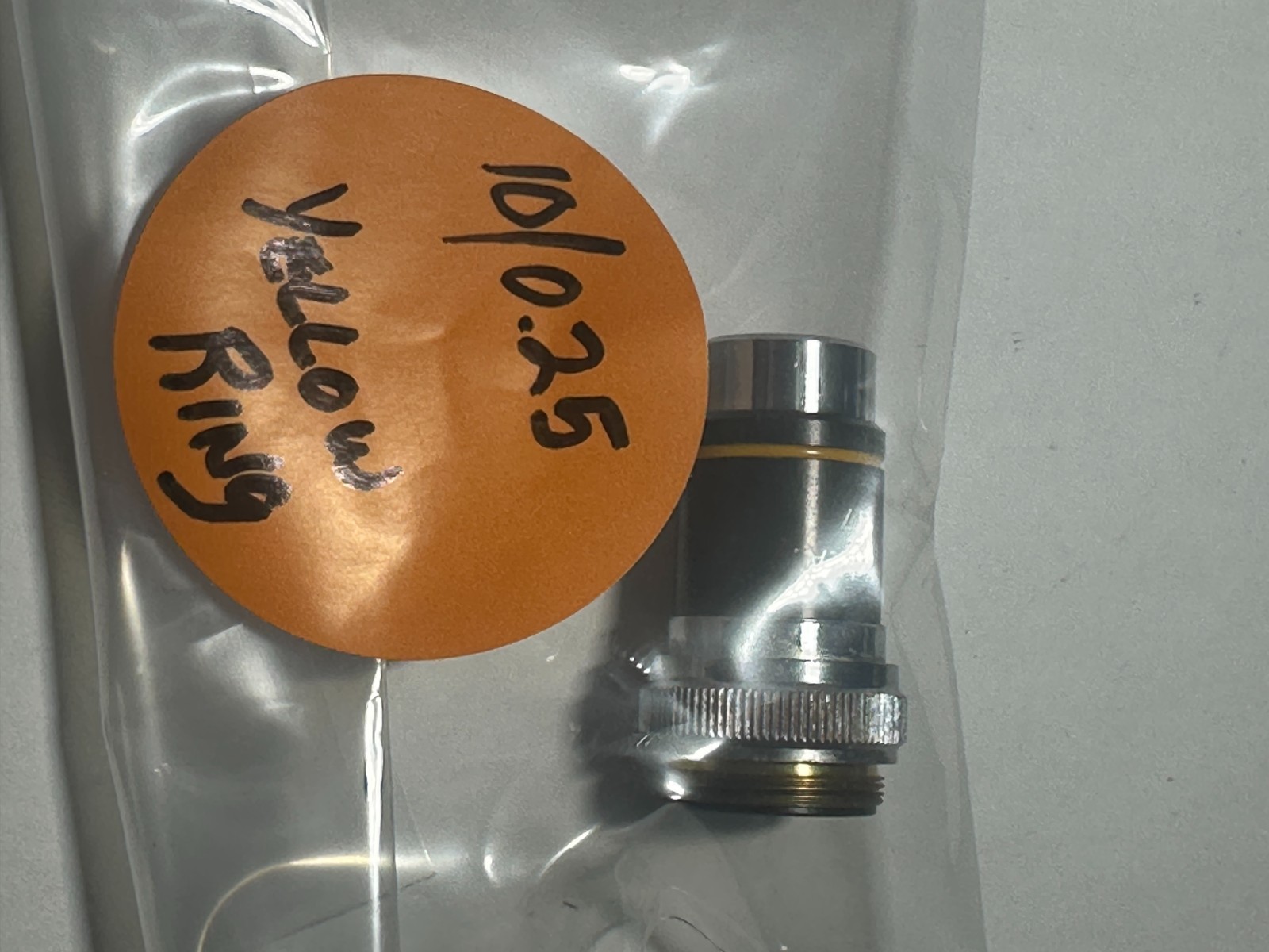 10/0.25 N.A. 160/0.17 Microscope Objective Bottom Yellow Stripe, Used