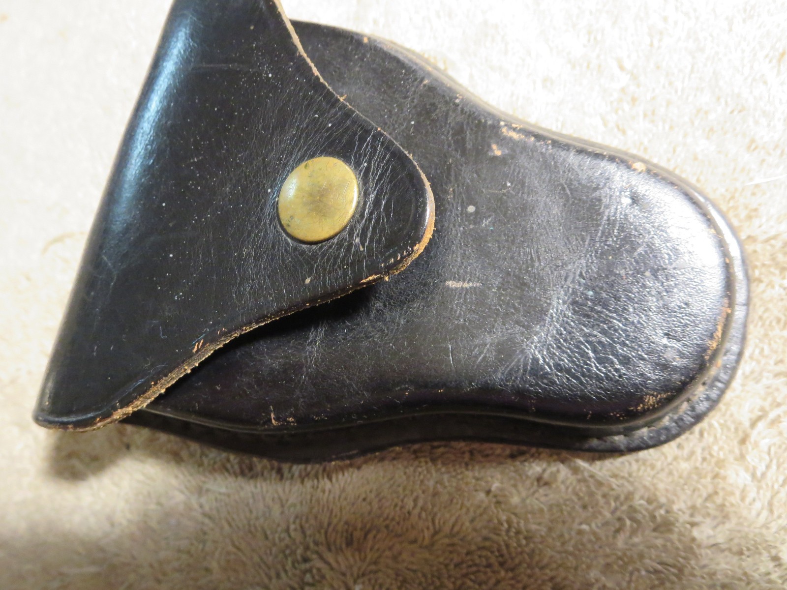 4 handcuff cases: 3 brand names in excellent cond. 1 older, modified, no name.