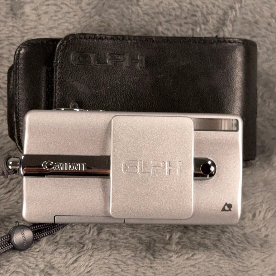 Canon ELPH Z3 APS Film Camera Silver 23.5-54mm Zoom Lens with Leather Case
