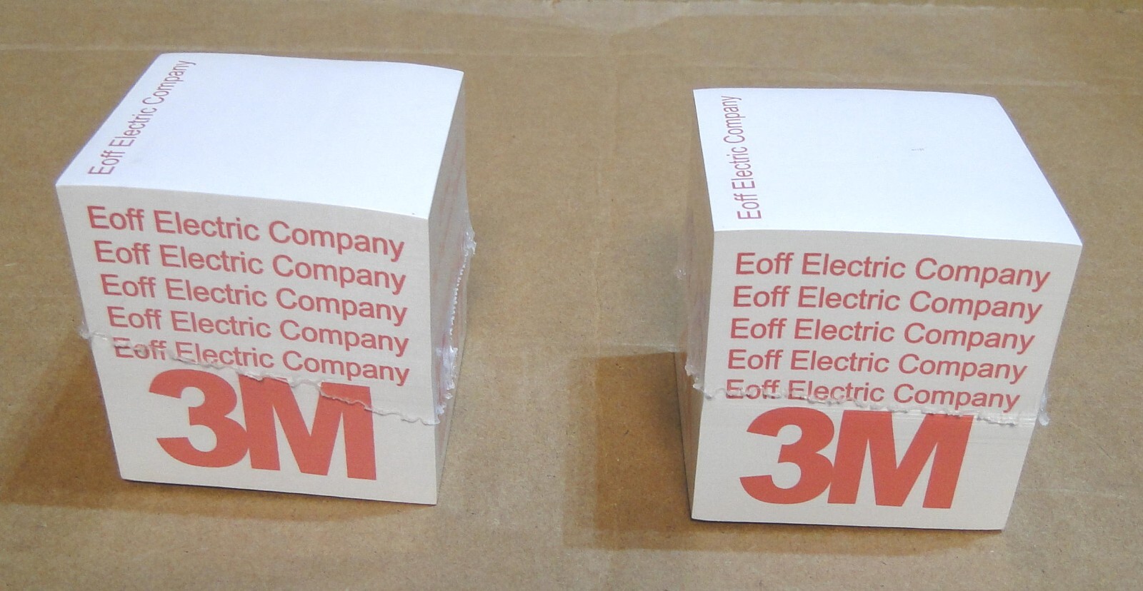 Two 3M 3×3 Post-It Notes Cubes w/Advertising: Alcan, G.E., Eoff Electric Company