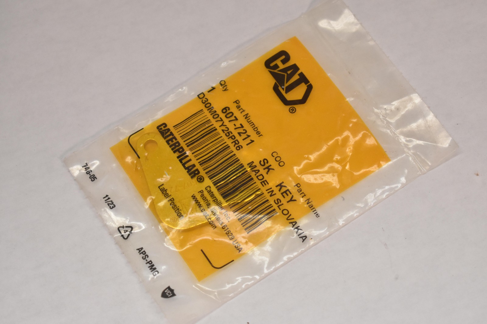 Caterpillar 607-7211 SK Key Silver Made In Slovakia CAT Equipment Part OEM