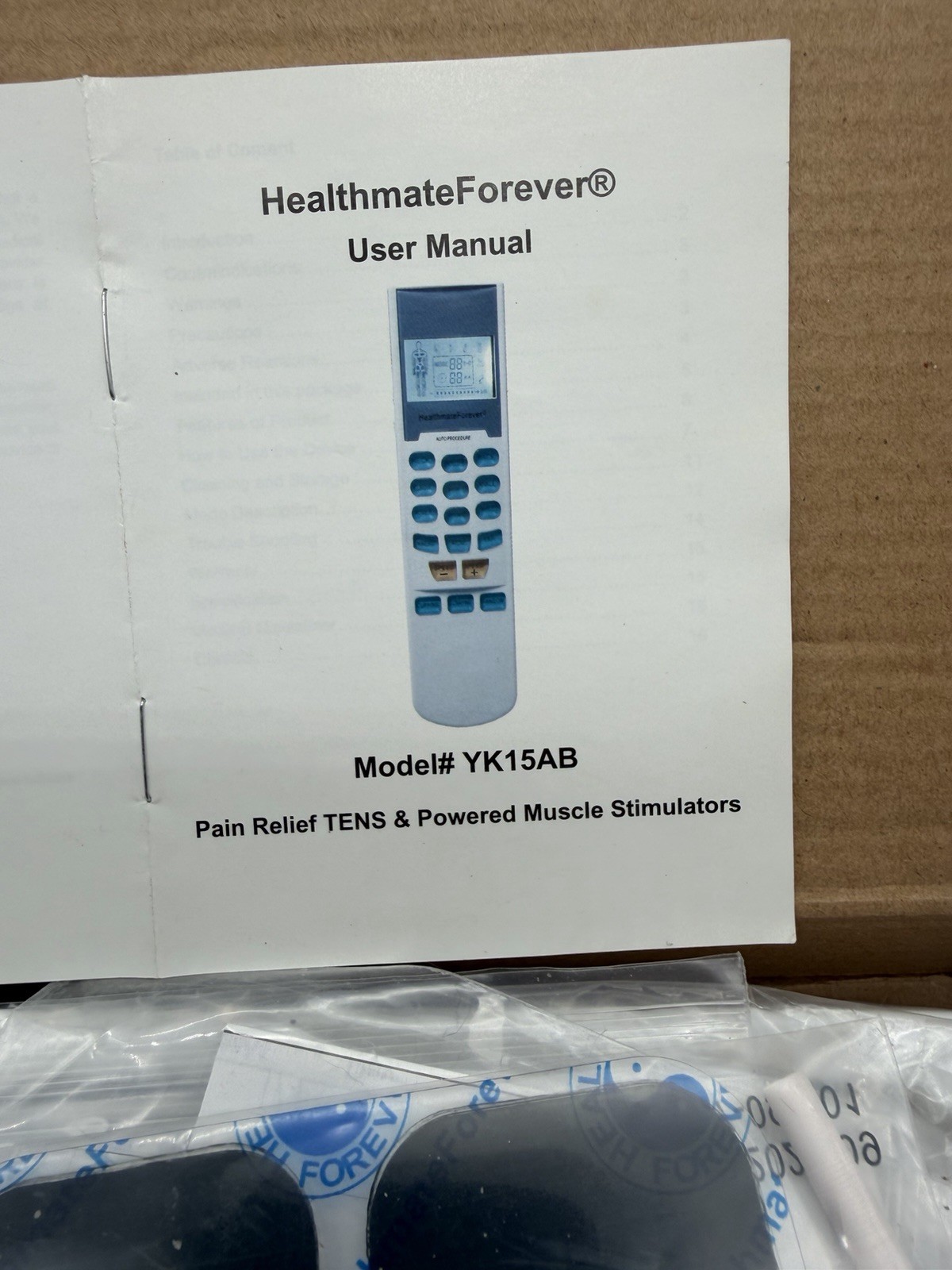 HealthmateForever TENS/EMS Unit 4-Channel Handheld Pulse Massager YK15AB