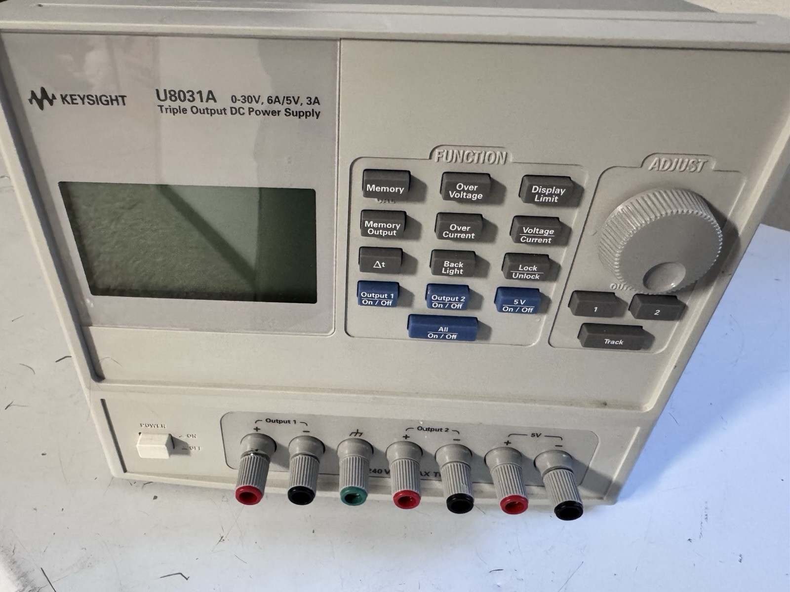 Keysight Agilent U8031A Triple Output DC Power Supply 0-30V, 6A / 5V, 3A