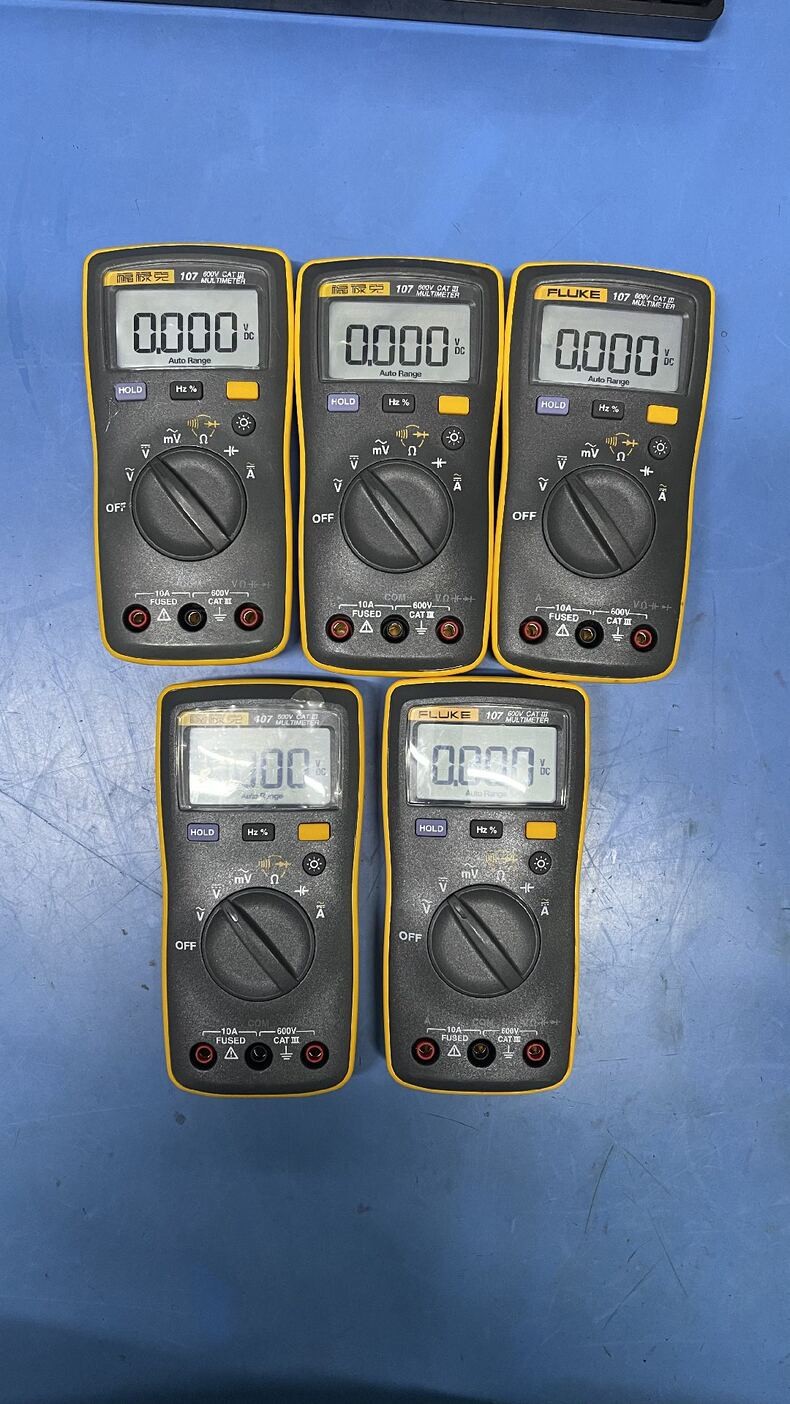 1PC Used Fluke 107 Handheld Digital Multimeter AC/DC Current Tester #W