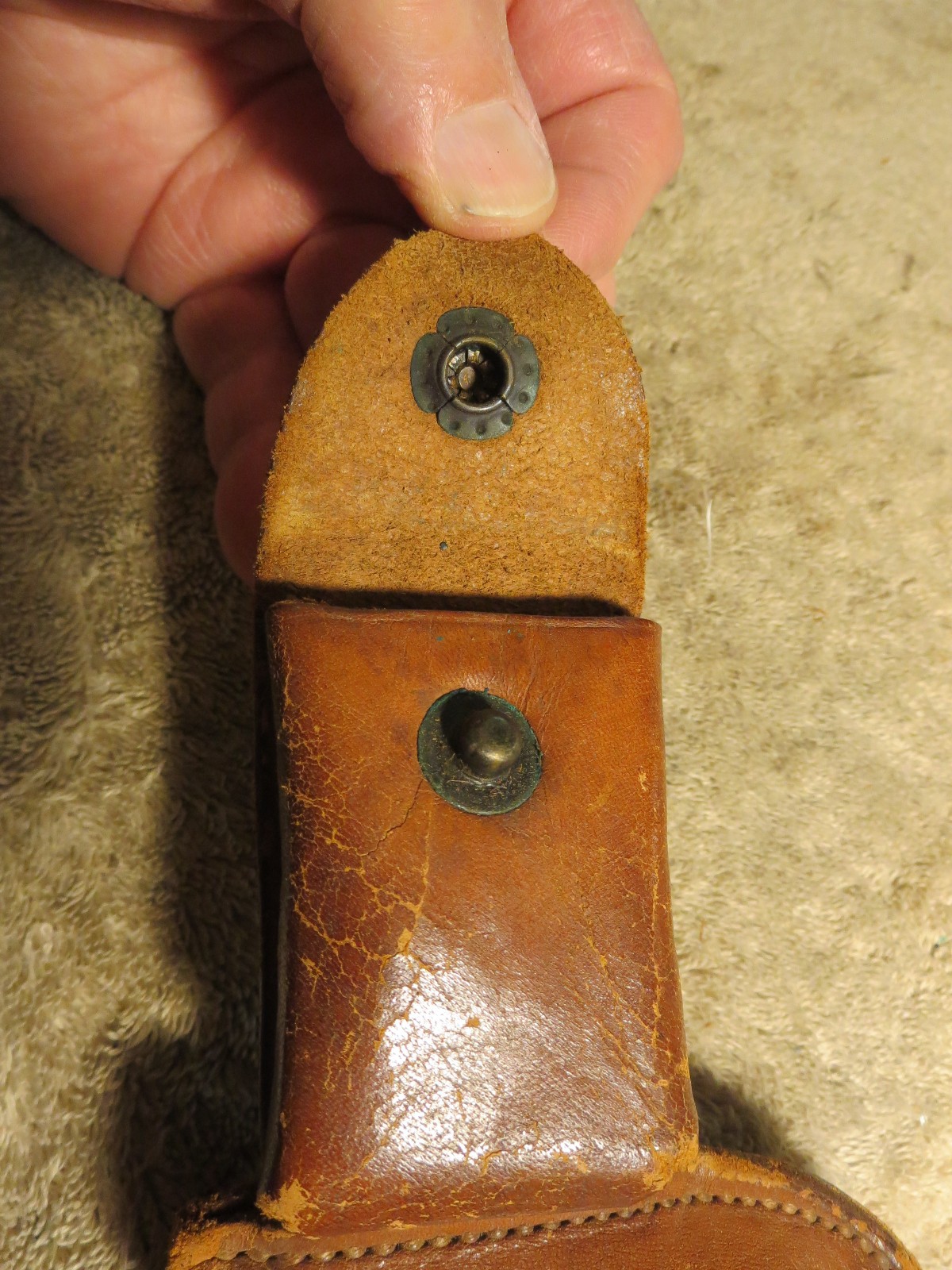 4 handcuff cases: 3 brand names in excellent cond. 1 older, modified, no name.