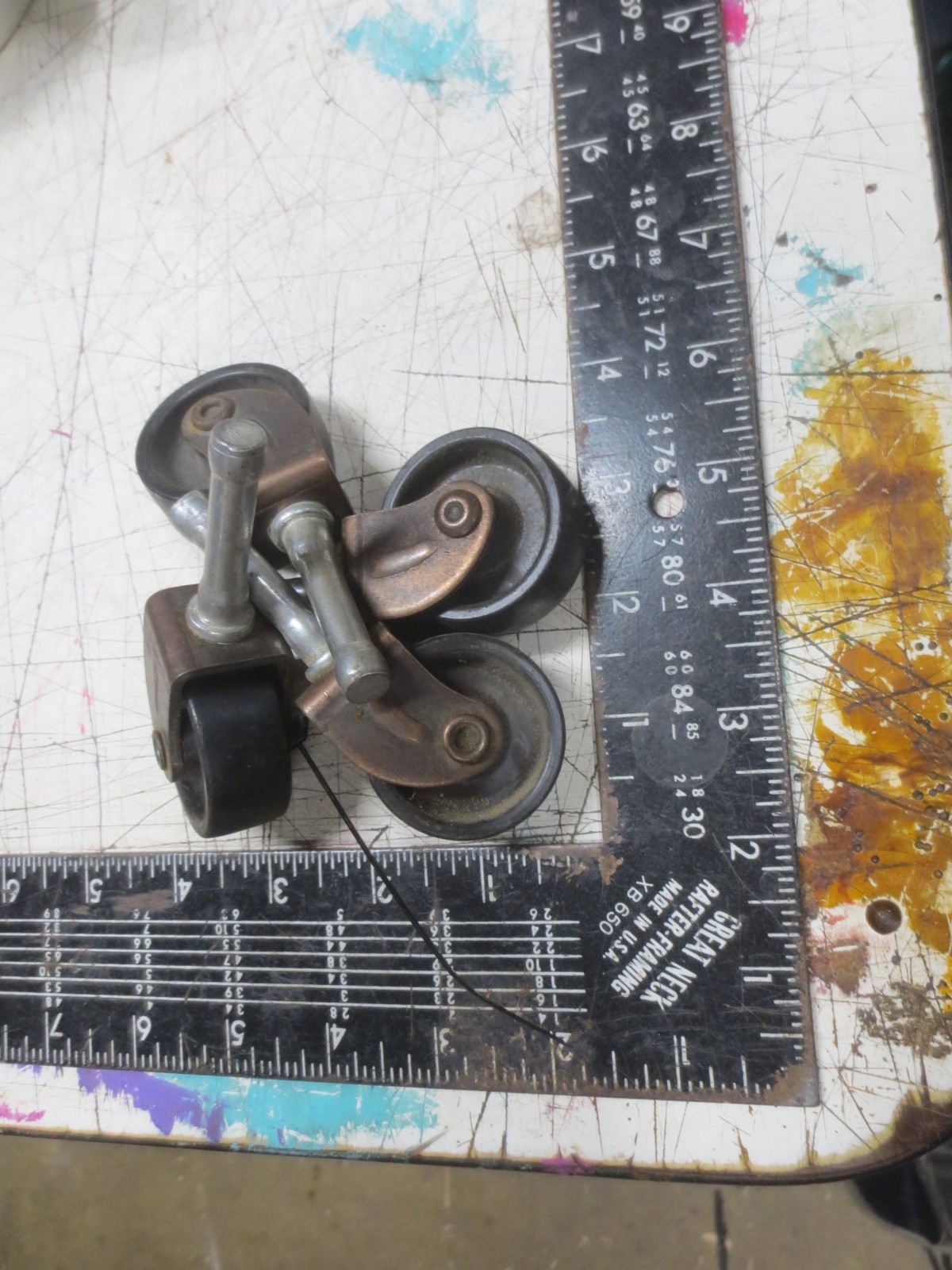 Vintage Set of 4 Black plastic / nylon Casters – Copper tone metal