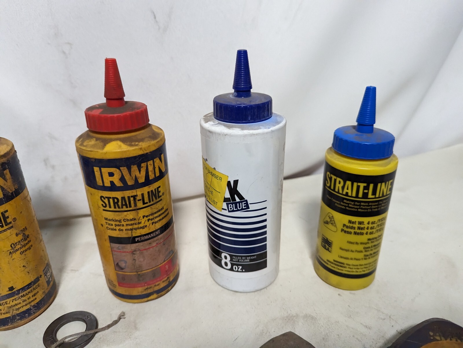 Lot of 9 chalk lines and 3.2 lbs of chalk: Milwaukee 48-22-3910, others