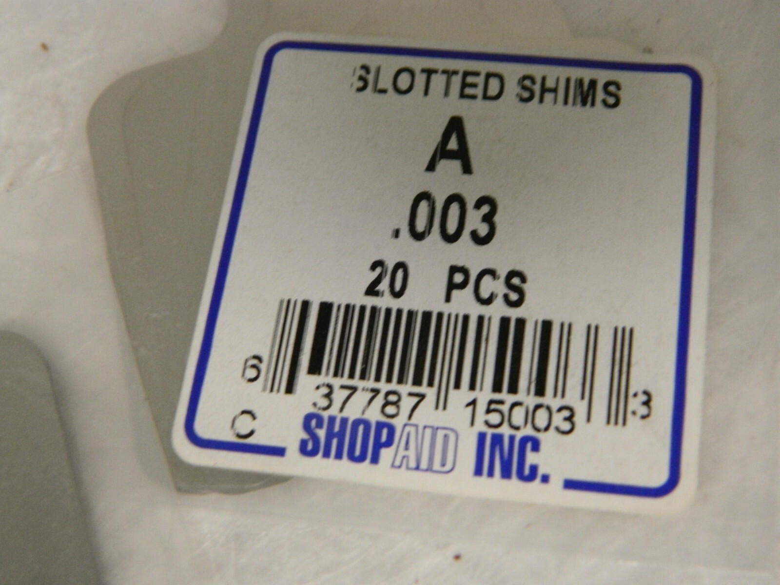 ShopAid Slotted Shim Stock 2″ Long x 2″ Wide x 0.003″ Thick Qty 40 00054379