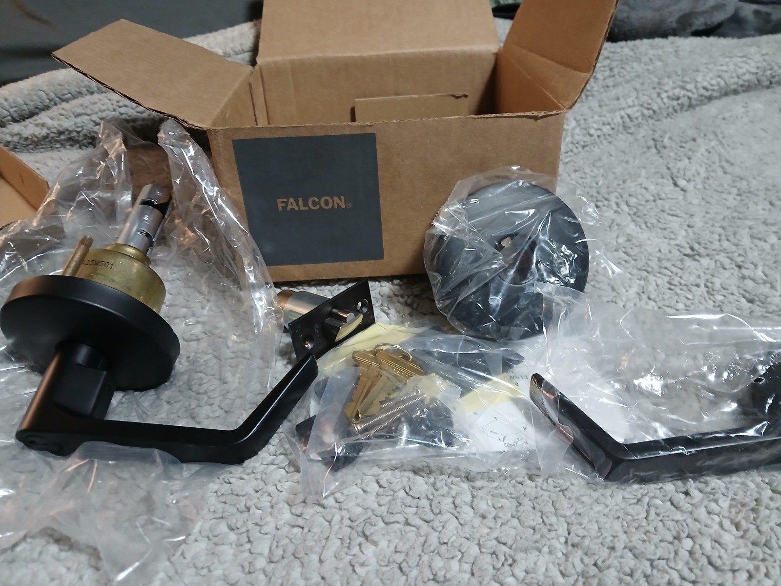 Falcon W-Series Storeroom Lever Lock Matte Black Self Closing with Keys