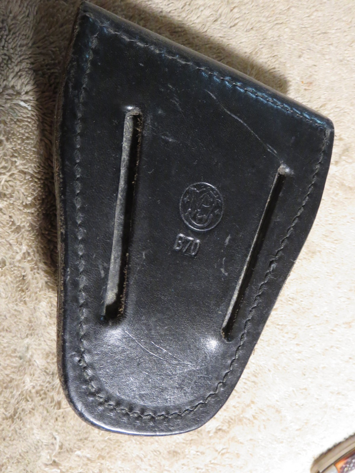 4 handcuff cases: 3 brand names in excellent cond. 1 older, modified, no name.
