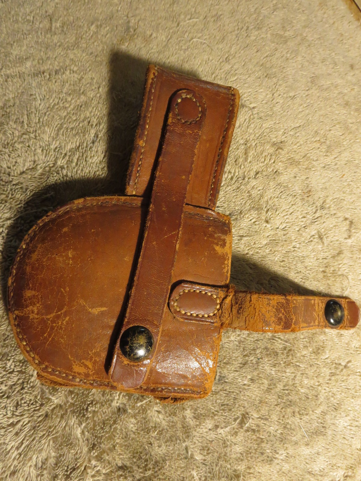 4 handcuff cases: 3 brand names in excellent cond. 1 older, modified, no name.