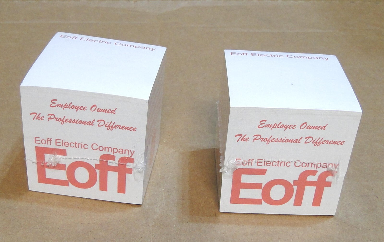 Two 3M 3×3 Post-It Notes Cubes w/Advertising: Alcan, G.E., Eoff Electric Company